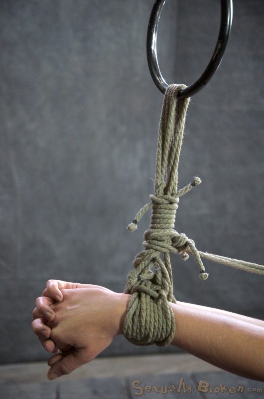 Roped bitch with small saggy tits sells her body to two men