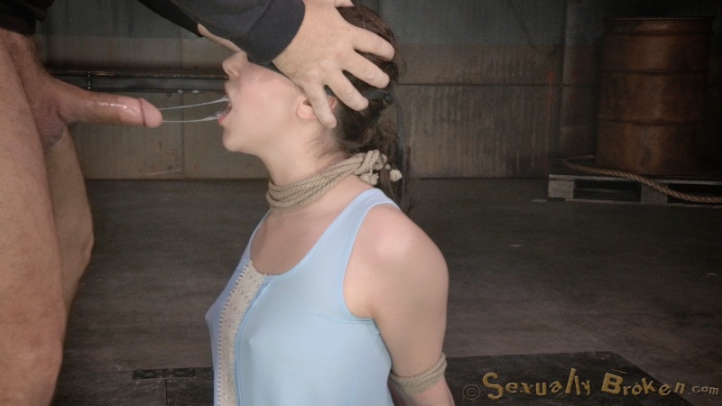 Blindfolded teen in blue dress sucks a dick with tied hands