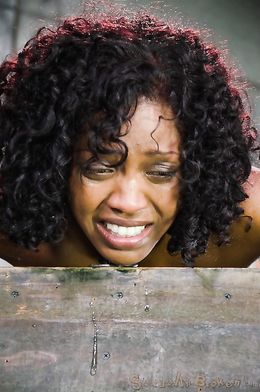 Cuffed Asian doll submissively sucks a white dick