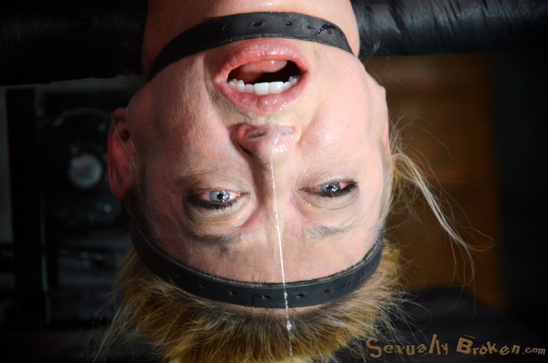 Extreme bondage and hardcore face fucking with a busty girl